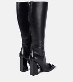 Find VERSACE Gianni Ribbon Leather Knee-high Boots on Editorialist. Upper: calf leather. Lining: leather. Sole: leather insole and sole. Toe shape: square toe. Made in Italy. Includes: shoe box. Designer color name: Black-Palladium. Closure: zipped side. Luxury Square Toe Calf Leather Heeled Boots, Luxury Calf Leather Knee-high Boots With Square Toe, Luxury Knee-high Boots With Sculpted Heel And Square Toe, Leather Knee-high Boots With Square Toe, Luxury Knee-high Boots With Square Toe And Reinforced Heel, Luxury Square Toe Platform Boots, Luxury Knee-high Boots With Reinforced Heel And Square Toe, Formal Knee-high Boots With Leather Sole And Square Toe, Luxury Heeled Boots With Square Toe And Padded Heel