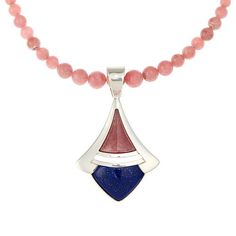 Jay King Rhodochrosite and Lapis Pendant with 24" Bead Necklace You'll be pretty in pink when you accessorize with this gemstone pendant and necklace combo from Jay King. The handcrafted sterling silver pendant pairs pink rhodochrosite with blue lapis in a fun, fashionable design that's easy to dress up or down. Also included is a rhodochrosite bead necklace to wear with the pendant or to style solo.       Pendant approx. 2-5/16"L x 1-3/8"W      Necklace approx. 24"L x 3/8"W with 2-3/4" extender Pink Polished Beaded Necklaces For Gifts, Pink Polished Bead Necklace For Gift, Pink Necklace With Polished Beads For Gift, Pink Necklaces With Polished Beads For Gifts, Pink Round Jewelry With Gemstone Beads, Pink Round Gemstone Beads Jewelry, Pink Sterling Silver Jewelry With Round Beads, Round Pink Jewelry With Gemstone Beads, Pink Round Gemstone Beaded Jewelry