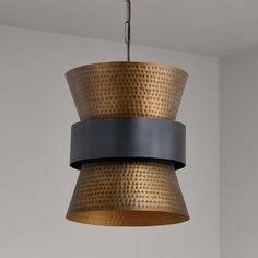 a light fixture hanging from a ceiling in a room