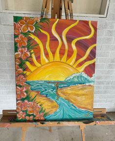 an easel with a painting on it in front of a white brick wall and the sun