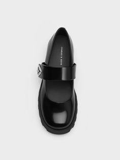 This product is made with at least 20% sustainable materials by weight. CHARLES & KEITH uses recycled, degradable, organic, and water-based materials in our eco-conscious collection. Featuring a shiny boxed finish, these understated black Trice Mary Janes will instantly set you apart from the crowd. To top it off, they are adorned with metallic accents on the sides, which add an edgy touch to the design. Whether you opt for a cute dress or a grunge-inspired outfit, these Mary Janes will put a great finishing touch on your look. Faux Leather Heels, Size Chart For Kids, Charles Keith, Black Box, Oh My God, Printables Kids, Eco Conscious, Metallic Accents, Cute Dress