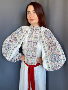 Gorgeous and rare Romanian dress  with absolutely unique geometric pattern! Very rich Embroidering!! Very interesting colours!!  The fabric is  bleached !  It is very difficult to stay invisible in it 🤩 Rather heavy fabric Ready to be worn! Universal size Will suit to S-L size     i am 167 cm and s-m sized Folk Style Embroidered Dress With Woven Motifs For Festivities, Folk Embroidered Dress With Woven Motifs For Festive Occasions, Bohemian Embroidered Dress With Woven Motifs For Festive Occasion, Traditional Embroidered Dress With Multicolor Sleeves, Bohemian White Embroidered Dress With Woven Motifs, White Bohemian Embroidered Dress With Woven Motifs, Bohemian Embroidered Dress With Woven Motifs, Bohemian Dress With Multicolor Embroidery And Woven Motifs, White Folk Embroidered Dress With Woven Motifs