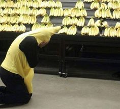 a person kneeling down in front of a bunch of bananas with the caption push me to the edge all my friends are dead