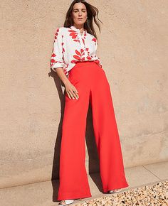 Elevate your wardrobe with the vibrant Fiery Red Palazzo Pants from Ann Taylor, a perfect blend of style and comfort. These pants are designed to flatter with a relaxed and easy fit, featuring a high-rise waist that sits just below the natural waistline and front pleats that enhance movement.

- Size: XS (Regular)
- Color: Fiery Red
- Material: 55% Linen, 43% Viscose, 2% Spandex
- Fit: Relaxed and easy
- Rise: High rise
- Leg Shape: Wide leg
- Length: Full length, 30 1/2" inseam with a 27" leg o Fun Colorful Work Outfits, Professional Outfits Women Colorful, Business Professional Outfits Colorful, Chic Red Wide Leg Dress Pants, Red High-waisted Wide Leg Pants For Spring, Luxe Moodboard, Modern Professional Outfits Women, Chic Red Luxury Wide Leg Pants, Fun Professional Outfits