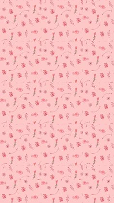 a pink background with small flowers and leaves