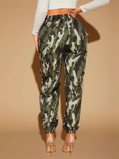 Unleash your inner adventurer with our Camo Print Flap Pocket Cargo Pants. These pants feature a stylish camo print that adds a rugged and military-inspired vibe to your look. The flap pockets provide convenient storage while enhancing the overall aesthetic. Crafted with precision and using high-quality materials, these cargo pants ensure durability and a comfortable fit. Embrace the spirit of adventure with these fashionable and practical cargo pants. Details: Waist Line: High Waist Composition Green Joggers With Pockets For Outdoor Activities, Green Cargo Pocket Joggers For Outdoor, Combat Bottoms With Side Pockets For Fall, Fall Combat Bottoms With Side Pockets, Combat Style Bottoms With Side Pockets For Fall, Camouflage Cargo Pants For Fall, Fall Camouflage Cargo Bottoms, Khaki Parachute Pants For Fall Outdoor Activities, Combat Bottoms With Multiple Pockets For Fall