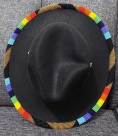 Black fedora hat with multicolored beads perfect for the summer season This hat fits all and can be worn anywhere Fedora Hat Summer, Beaded Hats, Fedora Beach, Black Fedora Hat, Indian Beadwork, Beaded Hat Bands, Black Fedora, Beautiful Days, Chapeau Cowboy