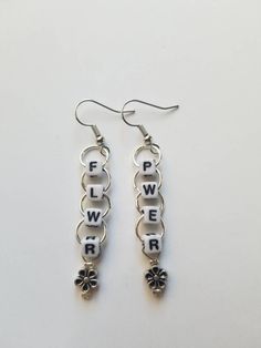 Make a statement and be unique with the super cute beaded earrings! Not buying for yourself? Gift this to a friend! . Shipping info: Your item will be shopped 1-2 days after you place your order with tracking. . Find more in my etsy shop or on my instagram @ sapphire__creations . For custom items, message me on here or Instagram! Trendy Beaded Flower Earrings For Gifts, Trendy Nickel-free Dangle Flower Earrings, Cute Beaded Jewelry, Word Earrings, Beaded Jewelry Earrings, Quirky Earrings, Funky Earrings, Earrings Flower, Earrings Cute