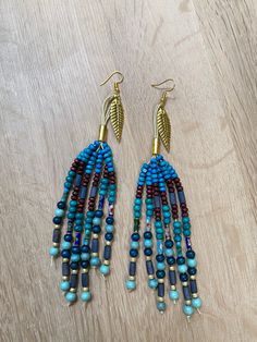 "Beaded statement earrings. Measurements: 15 cm (6\")long Match these statement earrings with one of our bags!" Hoop Earrings Big, Earrings With Beads, Fork Jewelry, Earrings Big, Hippie Festival, Boho Green, Colorful Earrings, Earrings Boho, Jewelry Earrings Hoops