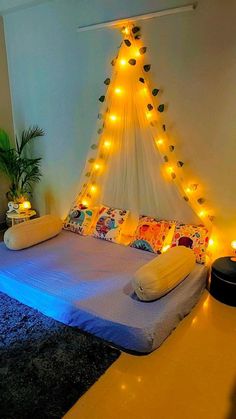 a bed that has some lights on it