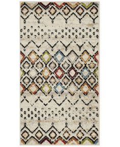 a white rug with multicolored diamonds on it