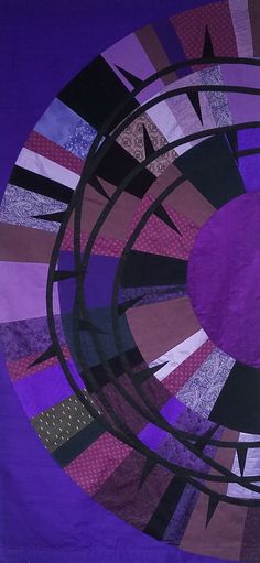 an abstract piece of art with purple and black colors