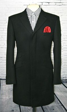 The Modclothin 3/4 Overcoat 100% wool. Crafted immaculately with classic red lining ticket pocket and breast pocket. An iconic look of days gone by. Top styling for any occasion.    Modclothin 3/4 Length Overcoat  100% Wool Breast Pocket Red Lining 4 Concealed Button Front 4 Button Cuff Single Vent Back 5 Colour Choices Please move up a size  if your wanting to wear over suit. *Please note these overcoat are handmade to order will take about 4 weeks before dispatch. Skinhead Clothing, Days Gone, 1960s Fashion, Black Jacket, Color Choices, Women's Blazer, Classic Style, Suit Jacket, Mens Jackets