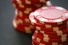 stack of red and white poker chips on black background royalty images, stock photos & more