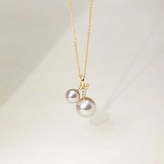 Material: 18K gold, Akoya pearl, diamond and 925 silver chain Akoya saltwater cultured pearl Size of pearl: around 5.5-6.0 mm and 8.0-8.5 mm Overall Length of Pendant: about 16.5 mm Length of silver chain: around 45 cm (adjustable) Weight of Diamonds: 4 diamond approx. 0.033 carats Handpicked of every pearl, only the top 1% of pearls are selected Handcrafted Lifetime warranty Fine Jewelry Pearl Chain Necklace For Anniversary, Exquisite Pearl Necklace In Yellow Gold, Yellow Gold Akoya Pearl Pendant Necklace, Fine Jewelry Yellow Gold Pearl Necklace In Sterling Silver, Gold Akoya Pearl Necklace With High Luster, Fine Jewelry Sterling Silver Yellow Gold Pearl Necklace, Gold High Luster Sterling Silver Necklace, Elegant Yellow Gold Sterling Silver Pearl Necklace, Fine Jewelry Akoya Pearl Necklace