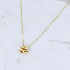 "14K Gold Dainty Love Knot Necklace - 14k Yellow Gold Love Knot Necklace, 14K White Gold Love Knot Necklace, 14K Rose Gold Love Knot Necklace The necklace will arrive in a gift box. ♡ The love knot charm is 14K gold, it is about 7mm ♡ 14K gold necklace is adjustable 16\"- 18\". ♡ 14K gold components Please read our policies before you place your order. https://www.etsy.com/shop/SashJewelry/policy?ref=shopinfo_policies_leftnav To see add-on click on the link below. https://www.etsy.com/shop/SashJ Gold Knot Necklace, Wedding Charm Necklace In 14k Gold, Tarnish Resistant, Elegant 14k Stamped Yellow Gold Charm Necklaces, Wedding 14k Gold Tarnish Resistant Charm Necklace, 14k Gold Infinity Necklace For Wedding, Yellow Gold Infinity Necklace For Wedding, Wedding Yellow Gold Infinity Necklace, Wedding 14k Gold Clavicle Chain Charm Necklaces, White Gold 14k Charm Necklaces For Wedding