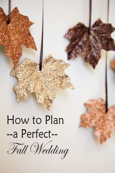 the words charming leaf art ideas are hanging from strings with gold and brown leaves on them