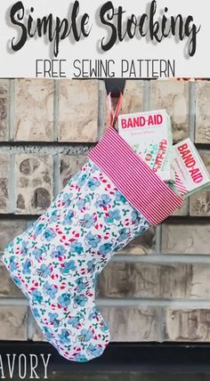 a stocking hanging from a brick wall with the text simple sewing free sewing pattern