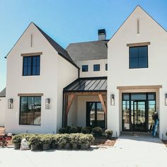 a large white house with lots of windows