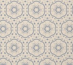 a blue and white wallpaper with circular designs