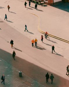 many people are walking around in the city