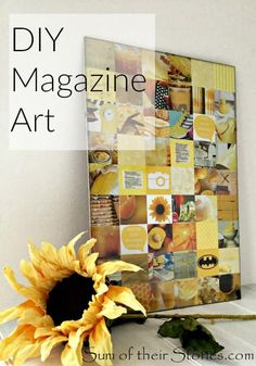 a sunflower sitting on top of a table next to a magazine cover and some leaves