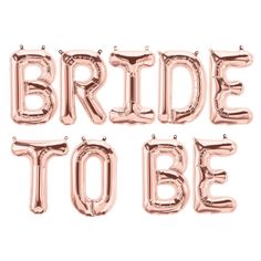 the words wild one are made out of balloons in pink and gold foil letters on a white background