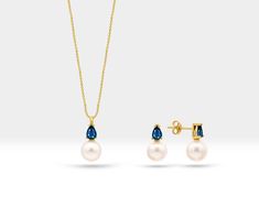 This Pearl Necklace and Earrings Set is a beautiful jewelry set are made from 14K solid gold, with the addition of pear-cut sapphires. This combination of pearls, gold, and sapphires can create a classic and elegant look, perfect for bridal jewelry. 5,00 mm Sapphire Necklace  Sapphire           :     App.  0,21 ct   Pearl                   :     1 piece (9,00 mm) Gram                 :     App.   1,65 GR Product Code  :     LS00005PS 5,00 mm Sapphire Earring  Sapphire           :      App.  0,34 Elegant Yellow Gold Jewelry Sets Diamond Cut, Hallmarked Yellow Gold Jewelry Sets For Anniversary, Yellow Gold Pear-shaped Jewelry With Prong Setting, Formal Fine Jewelry Sets In Yellow Gold, Formal Yellow Gold Fine Jewelry Sets, Formal Yellow Gold Jewelry Sets With Gemstones, Formal Yellow Gold Gemstone Jewelry Sets, Brilliant Cut Yellow Gold Pear Jewelry, Formal Hallmarked Yellow Gold Jewelry Sets