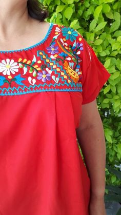 "*WASH SEPARATELY* Traditional Handmade Embroidery mexican Blouse. (Plus size - Full figured sizes) I know it is not just me who's noticed that it is getting harder and harder to find clothes that fit those beautiful curves, that is why we would like to be inclusive in all sizes, from XS to XXXL. Need a special size? We could make it - Message us! Ideal for a boho and vintage chic look with Folk Fabric flowers, for everyday or beach, perfect to combine with denim. Match with a Embroidery Belt fo Red Embroidered Blouse For Festivals, Red Blouse With Embroidered Border For Festivals, Traditional Red Blouse With Embroidered Border, Traditional Red Peasant Top With Floral Embroidery, Summer Red Blouse With Embroidered Neckline, Red Summer Blouse With Embroidered Neckline, Red Cotton Blouse With Embroidered Neckline, Folk Style Red Blouse For Festivals, Red Folk Blouse For Festivals