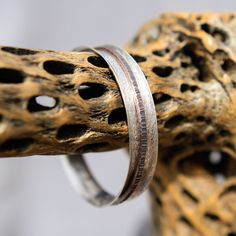 One of a kind! Custom shaped Sterling Silver Spinner Bangle Bracelet hand crafted high in the mountains of Northern New Mexico by local silversmith and lapidary artist Michael Silberhorn. Base is Sterling Silver with one (1) Copper spinner that moves freely inside ... Inspired by the spinner rings. I hand form, hand texture and silversmith all the materials for a truly unique piece of art! All metals have a hand applied patina finish for a truly antique Southwest feel. This item is one of a kind Hand Forged Round Bracelets As Gift, Hand Forged Bracelets As Gift, Artisan Sterling Silver Bracelet With Polished Finish, Sterling Silver Etched Bracelets For Anniversary, Handmade Sterling Silver Bangle For Anniversary, Handmade Rustic Bangle Jewelry, Rustic Handmade Bangle Jewelry, Handmade Rustic Style Bangle Jewelry, Etched Sterling Silver Bracelets As Gift