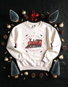 Discover the season's top trending Christmas sweatshirts, from classic designs to funny and merry options. Whether you prefer a Christmas tree, a cozy white style, or a festive message, these popular sweatshirts are perfect for spreading holiday cheer. Shop now to find your perfect fit for the holidays! White Cotton Christmas Sweatshirt, White Winter Sweatshirt For Gift, White Winter Sweatshirt Gift, White Sweatshirt For Winter Gift, White Winter Sweatshirt As A Gift, White Embroidered Sweatshirt As Winter Gift, White Long Sleeve Holiday Sweatshirt, Christmas Cotton Crew Neck Hoodie, Christmas Cotton Hoodie With Crew Neck