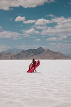 A girl in red dress at salt flats in Utah Salt Fields Photography, Salt Plains Photoshoot, Utah Salt Flats Photography, Salt Plains Oklahoma Photoshoot, Salt Flats Maternity Photos, Salt Flats Utah Photoshoot, Bonneville Salt Flats Photography, Salt Flats Photoshoot