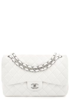 Chanel Jumbo Classic Double Flap Creme quilted calfskin shoulder bag with silver-tone hardware, convertible chain-link and leather shoulder strap, single exterior patch pocket, single zip pocket at front flap underside, single slit pocket under front flap. This item is in very good condition; some slight discoloring on bottom panel. Length: 11.5"Depth: 3.25"Height: 7.5" Brand = Chanel Color = Cream Condition = Very Good Item Number: 1801-58 Item ID: 167235 Category: Handbag Cream Chanel Bag, Chanel Jumbo, Chanel Store, Luxury Purses, Fame Dr, Gold Ounce, Chanel Bags, Dream Board, Vuitton Bag