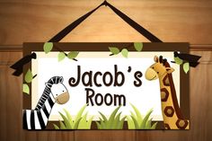 a sign that says jacob's room with two giraffes and a zebra