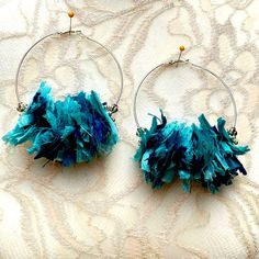 Huge 80mm (3.2 inches) Silver Plated Hoop with Sari Ribbon Motifs. Boho, light weight, statement earrings.♥ 80mm (3.2") Silver plated hoop earrings with Turquoise Sari Silk Ribbon Motifs♥ Free Shipping♥ Ships in 1 Day♥ Matching necklace is available: https://blingbeadedbaubles.com/collections/fiber-statement-necklace/products/copy-of-flower-statement-necklace-colorful-boho-sari-ribbon-fiber-collar-unique-artisan-jewelry The yarn is a beautiful handmade sari silk ribbon, dyed and made for us by a Sari Silk Earrings, Silk Earrings, Lotus Flower Jewelry, Textile Earrings, Trending Crafts, Rough Rose Quartz, Geode Jewelry, Sari Ribbon, Good Luck Necklace