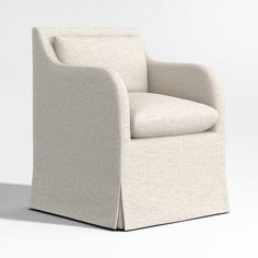 an upholstered chair with a white background