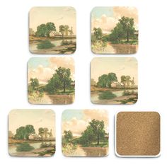 four coasters with trees and water on them