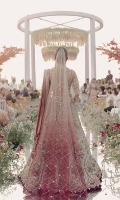 the back of a woman's wedding dress at a ceremony