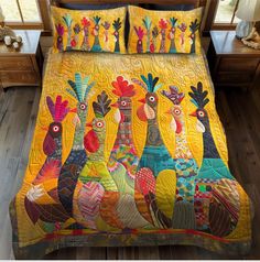 a bed covered in yellow quilts with colorful birds on the cover and pillow cases