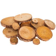 a pile of cut wood logs on a white background