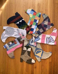 several pairs of socks laid out on the floor