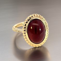 Natural Solitaire Finely Faceted Quality Spessartite Garnet Ring 6.5 14k Y Gold 8.08 Cts Certified $3,150 310586This is a Unique Custom Made Glamorous Piece of Jewelry!Nothing says, “I Love you” more than Diamonds and Pearls!This Solitaire Spessartite Garnet Ring has been Certified, Inspected, and Appraised by Gemological Appraisal LaboratoryGemological Appraisal Laboratory of America is a proud member of:- GIA Alumni Association- National Association of Jewelry Appraisers- International Consort Formal Yellow Gold Cabochon Sapphire Ring, Formal Fine Jewelry Ring With Cabochon, Formal Fine Jewelry Cabochon Ring, Classic Yellow Gold Sapphire Ring With Cabochon, Fine Jewelry Ruby Cabochon Ring, Formal Oval Cabochon Ruby Ring With Polished Finish, Formal Yellow Gold Ruby Ring With Cabochon, Luxury Oval Cabochon 14k Stamped Rings, Luxury 14k Stamped Oval Cabochon Ring