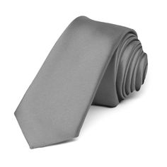 This gray premium tie is cut in our skinniest and trendiest 2-inch width. Its heavyweight woven material and smooth satin finish provides a sharp look that is suited for your most formal occasions.We recommend this shade for a medium gray color, not too light, not too dark. Product Features • Skinny 2" width, at the widest point • 57" length, tip to tip• Color is gray • Made from 100% Polyester Microfiber • Smooth, satin finish • Imported Classic Gray Tie For Wedding, Gray Wedding Tie, Gray Standard Tie For Formal Occasions, Classic Fitted Silver Suit And Tie Accessories, Classic Gray Tie For Black Tie Events, Classic Gray Standard Tie And Suit Accessories, Classic Silver Tie, Gray Suit And Tie Accessories For Black Tie Event, Classic Solid Satin Tie