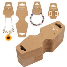 several different items are shown in the shape of a guitar pick up board and necklaces