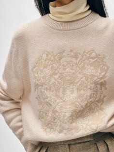 We partnered with The Metropolitan Museum of Art for the creation of this limited-edition cashmere crewneck sweater. It features a Hans Christian Anderson motif on the chest, originally drawn and cut from paper, telling the story of a Danish fairytale in embroidery resembling needlepoint. Wear it to immediately add interest to an otherwise simple look. Details Relaxed fit. Long sleeve. Length in size small is 22". The model is 5'8 1/2" and is wearing a size small. 100% Cashmere. Dry clean only. Hans Christian Anderson, Cashmere Travel Wrap, Fitted Turtleneck, Embroidered Crewneck, Hans Christian, Embroidered Sweater, Jacquard Knit, Cardigan Top, Wrap Sweater