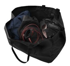 An oversized, waterproof tote that carries all your gear and a little extra Black Nylon Gym Bag For Weekend Trips, Black Nylon Gym Bag For Travel, Black Packable Travel Bag For Outdoor, Practical Black Packable Travel Bag, Black Tote Duffle Bag For Outdoor, Black Tote Travel Bag For Outdoor Activities, Black Nylon Weekender Bag For Outdoor, Osprey Packs, Surfboard Bag