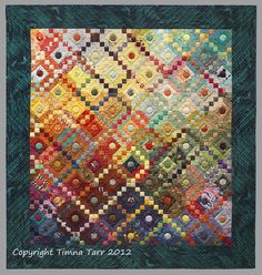 the quilt is made with many different colors