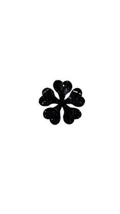 four leaf clover in black ink on white paper