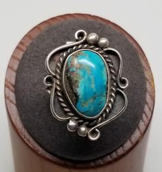 Vintage Sterling with Turquoise Native Ring, Size 8. Marked CS and tested positive as sterling. Stone is 16 x 10mm. Ring is 28mm wide. Weighs 0.22 ozt.  We do not check prongs for wear or stones for looseness.  All items are sold as is-noting that we are a resale shop  so everything here had a previous owner! We will include flaws in the description when noted. This is one of the reasons our items are more affordable than new at a jewelry store. Are these stones real or fake? Aside from diamonds, we do not know if any gemstones are natural or synthetic. We will state on certain gemstones, that we know 100%, if they are created or fake due to their lack of inclusions. For this reason, we do not sell any diamonds without inclusions, and the larger diamonds (half ct+) are soft graded. In rece Vintage Native American Jewelry, European Jewelry, Vintage Fine Jewelry, Star Sapphire, American Jewelry, Pure Gold, Native American Jewelry, Selling Jewelry, Turquoise Jewelry