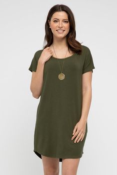 The Niah T-Shirt Dress in Dark Olive will be your summer go-to 'throw on' piece this season! There are countless ways to wear this number - pair with sneakers, simple flats or your favourite wedges for balmy nights. For a bit of edge, tuck it into denim cut offs, or throw it over a swim suit at the beach. For a laidback look with coverage wear it as a longer tunic over relaxed pants or leggings. Show us your favourite ways to style it!Features: Scoop neckline Above knee length Relaxed / oversized fit through the body Length: 82cm (size medium) Styling: Wear this style as a tunic with our 3/4 leggings. Sizing: Karina is wearing a size XS. She is 175cm (5'7") tall and normally wears a size 8Fabric: 93% Bamboo / 7% Spandex Relaxed Pants, Cut Offs, Denim Cutoffs, Long Tunic, Show Us, Tee Dress, Swim Suit, Individual Style, Above Knee